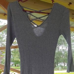 Woman's three-quater sleeve striped fitted dress.